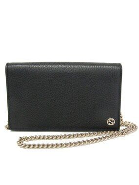 Gucci black wallet size 7.5 x4.5 size bag in good condition with shoulder chain
